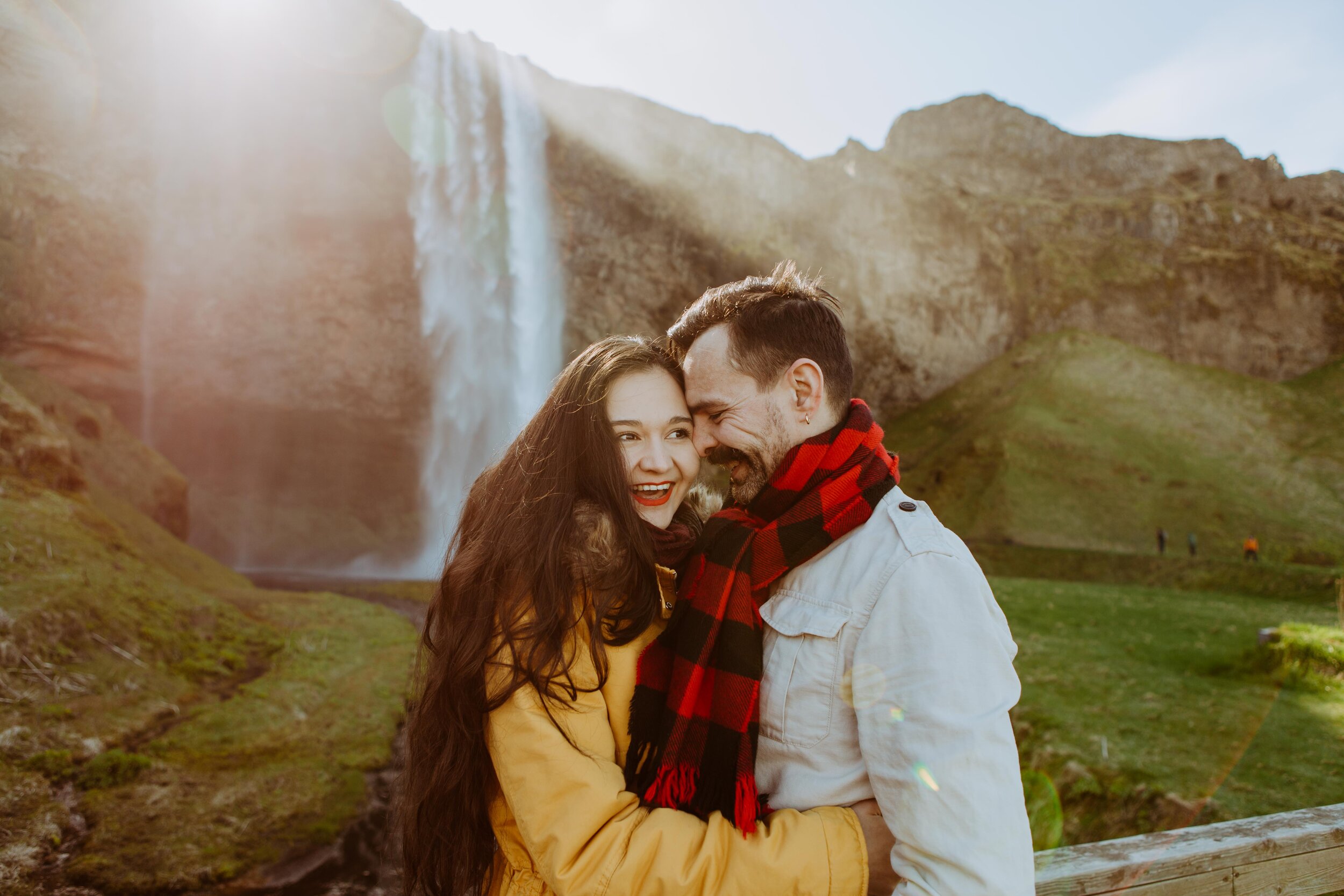 icelandic waterfall engagement photo shoot by a san diego and destination wedding photographer