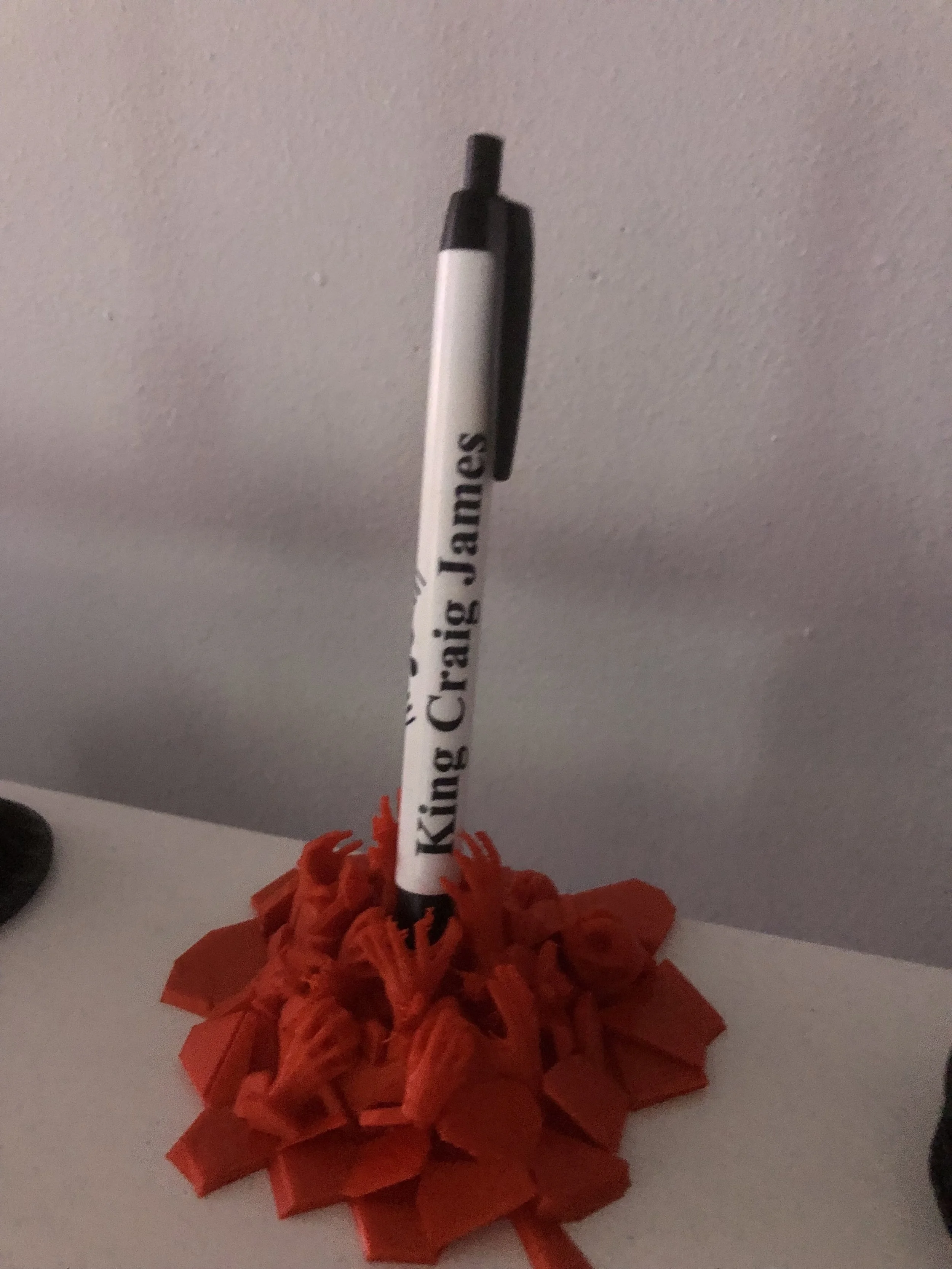 A custom pen sitting in a 3d printed grave to the entrance of hell. That’s KCJ at its finest.