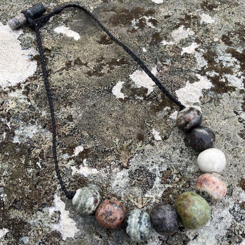 Mixed beaded necklaces, representing the geology of the Hebrides, are now available on our website.
Each bead is hand carved and the cords hand braided, finished with a stone toggle fastening. Each piece is unique and will not be repeated.
https://ww
