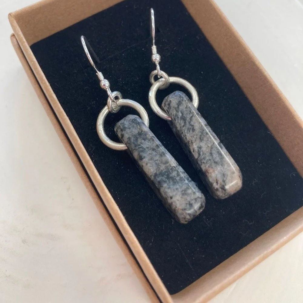 After a long wait, here are our new batch of Hebridean stone earrings, including our customer favourite greenstone (olivine), which seems to always sell the quickest!

These are all handcarved and fitted with sterling silver jump rings and ear hooks.