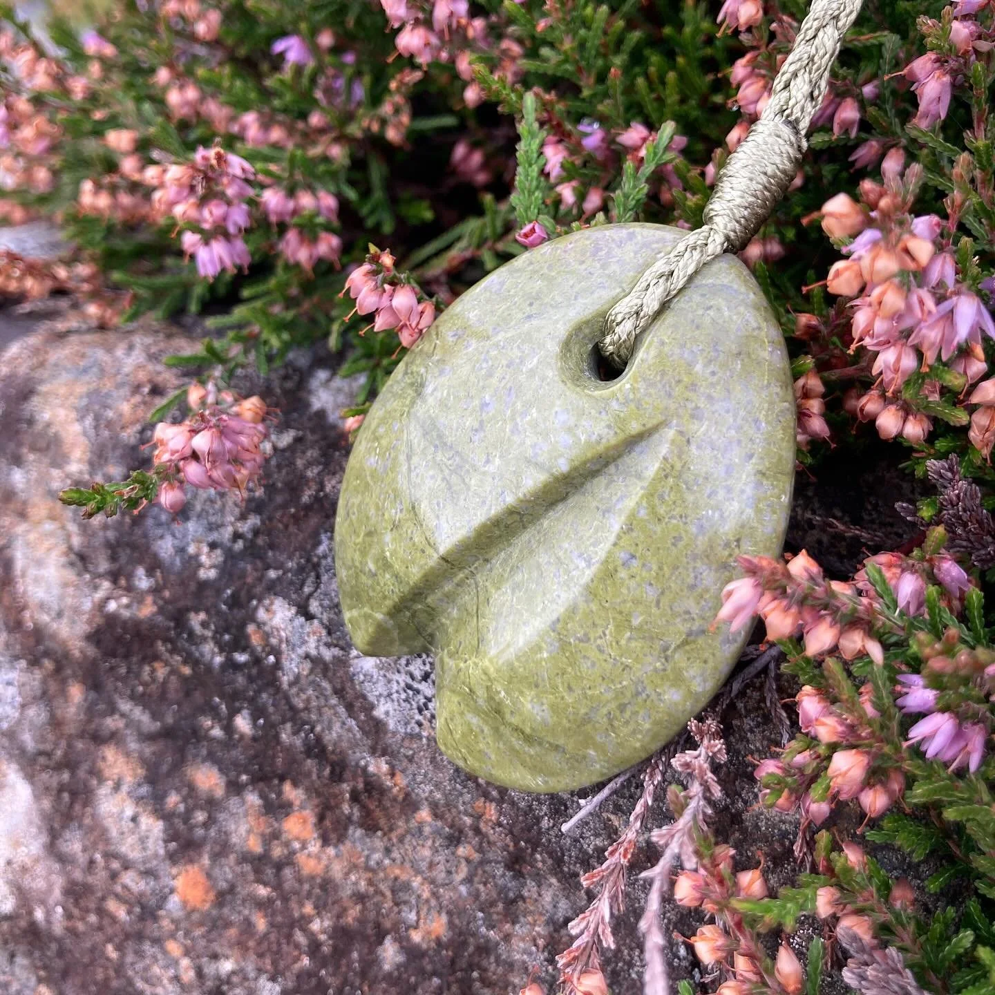 Our new special collection of carved pendants is inspired by the emergent forms of nature. 

These handcarved pieces take on the curves of bulbs, splitting seed heads and tulips.

Created from natural Hebridean stone, some sit in a pleasing mirrored 