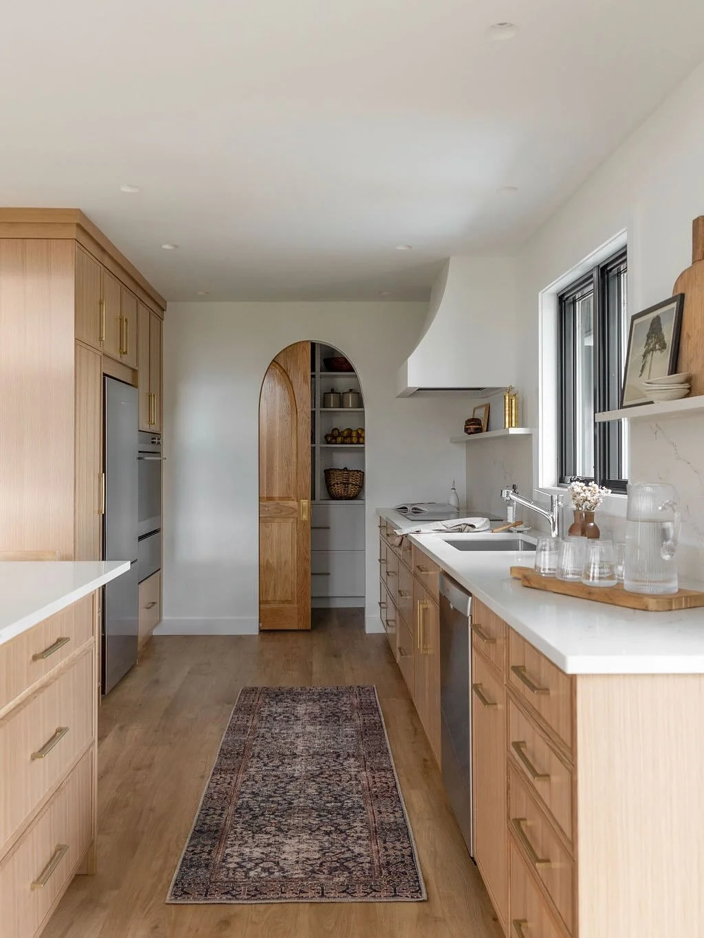 A transformation that blends beauty with function. This kitchen redesign maximizes storage, elevates finishes, and creates a space that feels timeless yet inviting. 

Swipe to see the before photo! 

#AmbianceDoesEuroModern

Design by @ambianceinteri