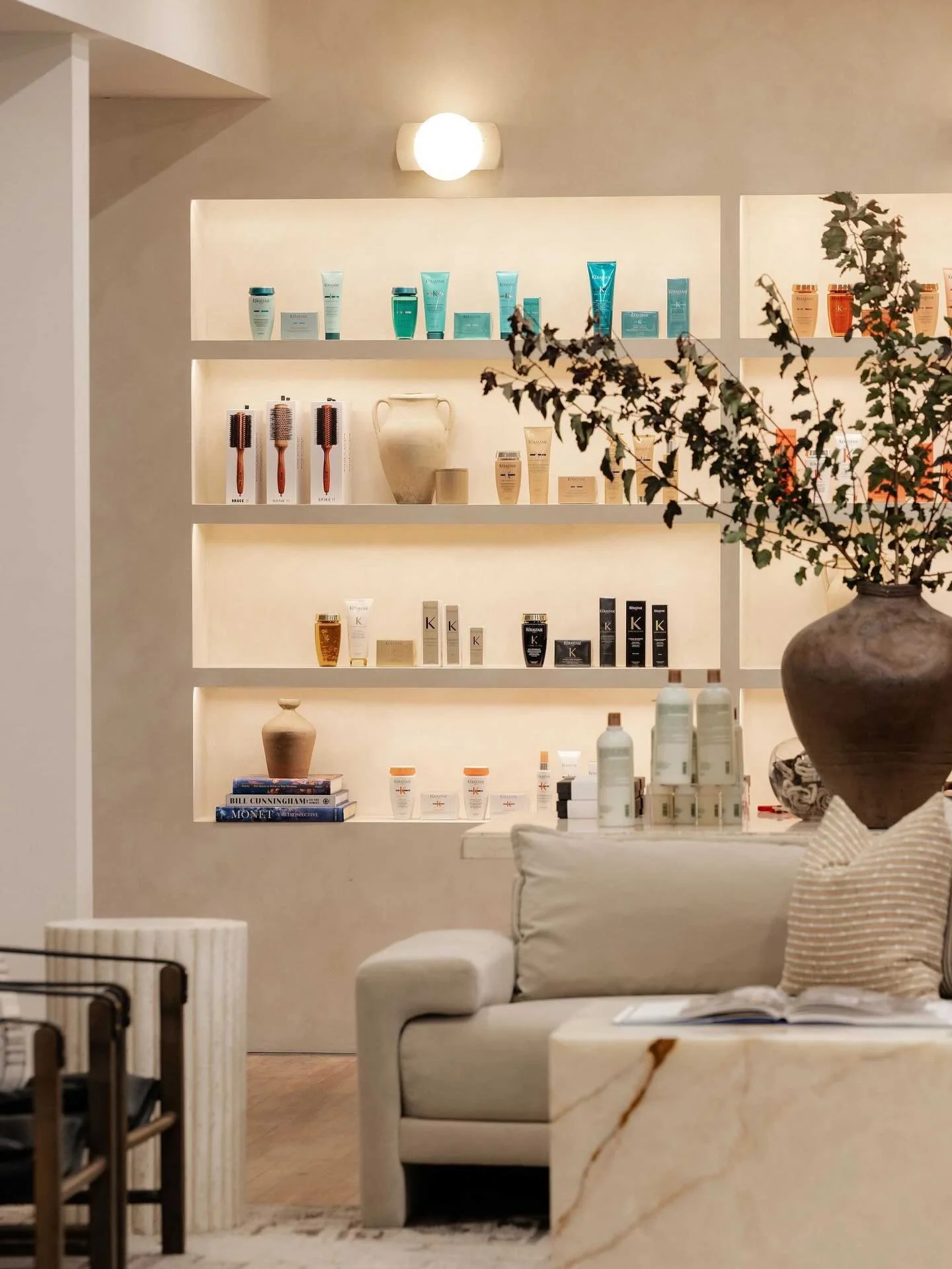 Comin&rsquo; atcha with round #2 if our @thatchandfringe salon reveal! This week we are showing you the lounge and retail zone. Right from our very first walkthrough @Charisejuanita had a vision of sexy glowing shelving built right into the wall to d