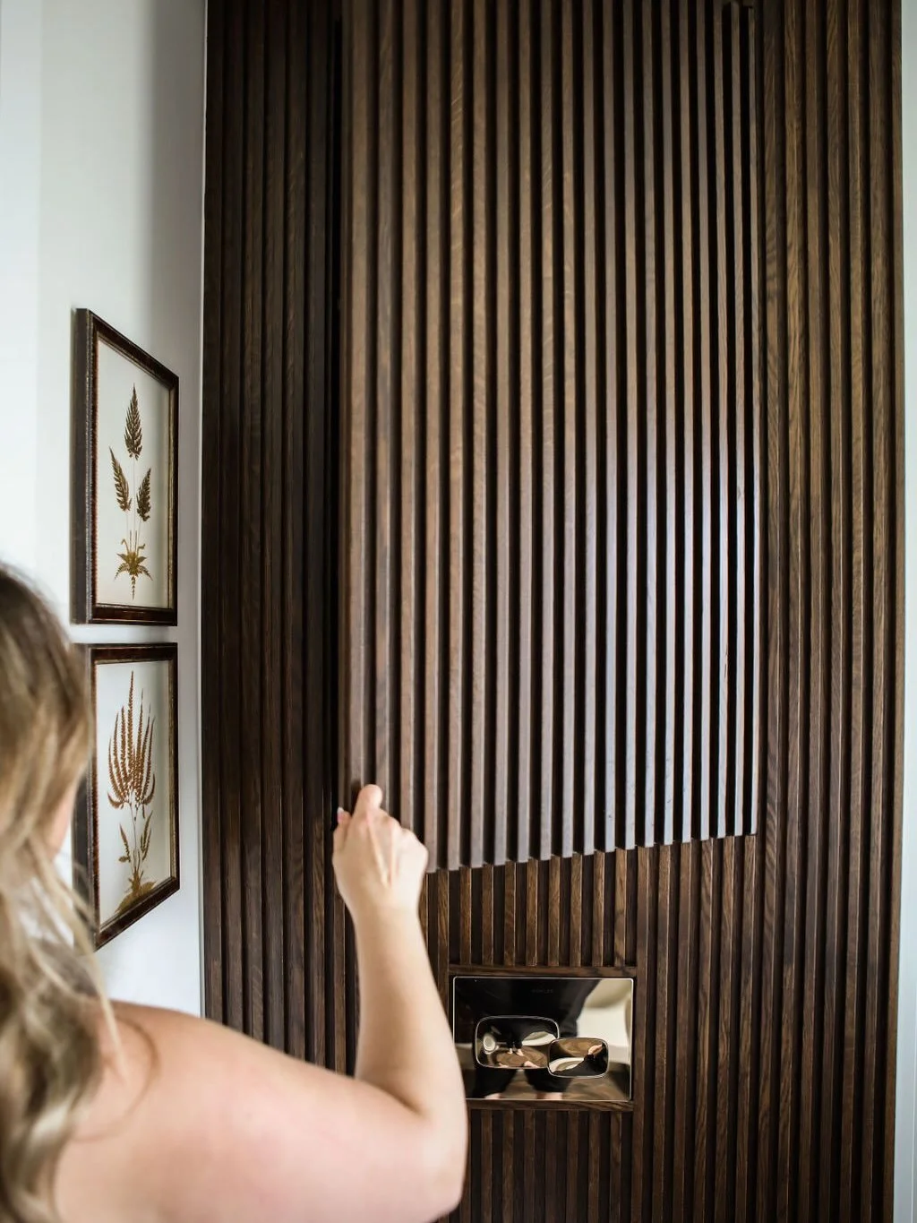 minimal look for their main floor bathroom, but with the vanity design not involving any storage we needed to figure something else out! Instead of a basic over the toilet cabinet (ack! Never!) we opted for a (square) reeded hidden cabinet, with a pu
