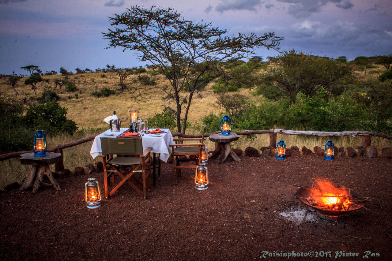 lewa_safari_camp_-_activities_-_romantic_dinner_by_camp_fire_cpieter_ras-71.jpg