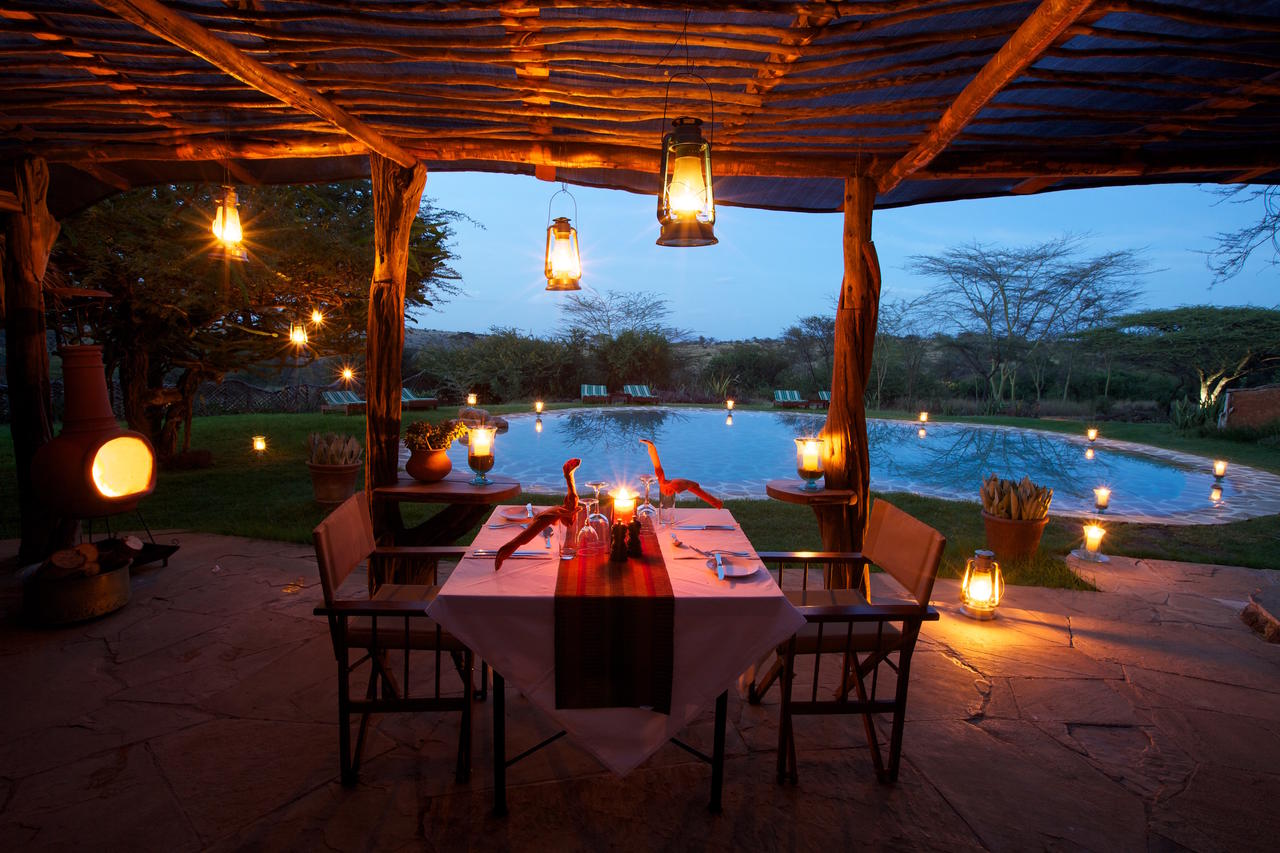 lewa_safari_camp_-_activities_-_romantic_dinner_by_swimming_pool1.jpg