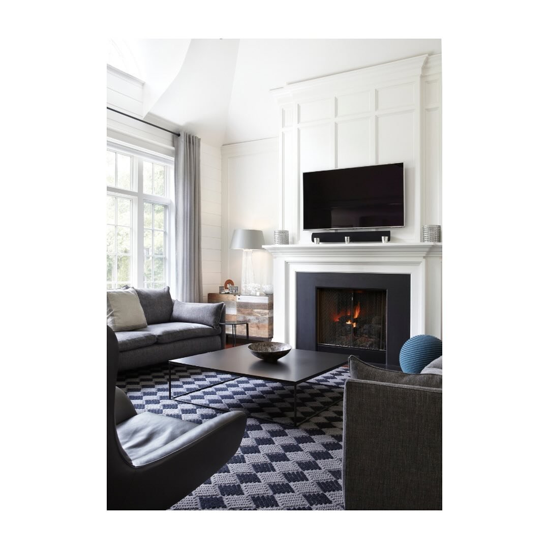 This renovation involved 3 key rooms: the family room, kitchen and living room.

We removed the old dowdy built-ins and added a custom mantle around the fireplace. Together the new redesigned mantel and horizontal shiplap create casual but chic look.