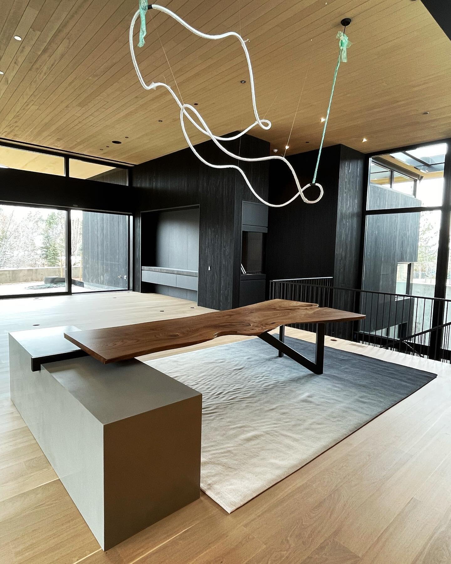 A little nibble of this beauty of a home. The main install is happening in a couple short weeks but this dining table made with a custom concrete plinth and live edge elm slab got to come home early.