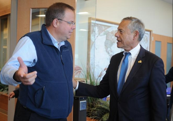 Jason Lefferts and State Representative Paul Schmid discuss health insurance in Fall River