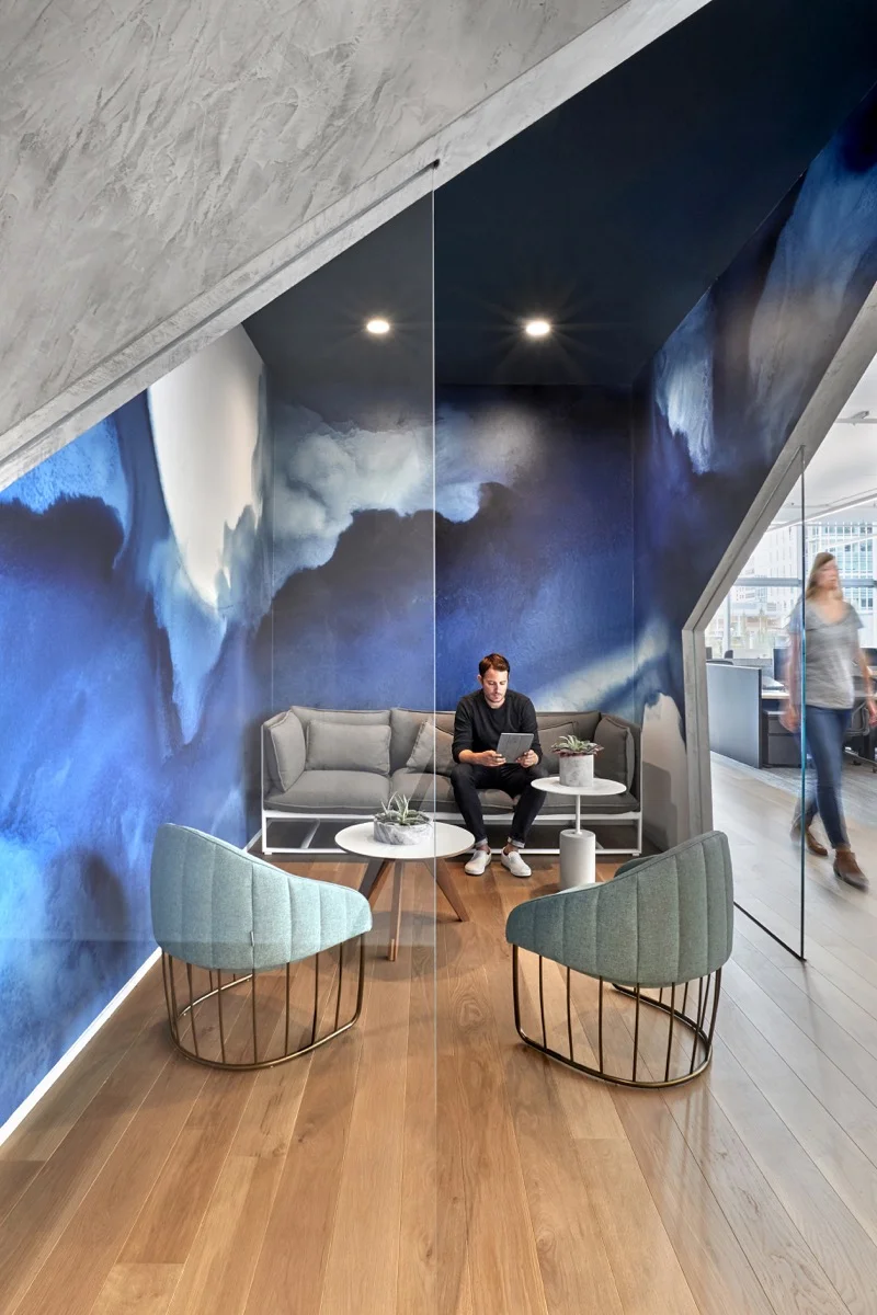 The striking blue cove is a place to sit and relax or have a meeting for the Slack team.