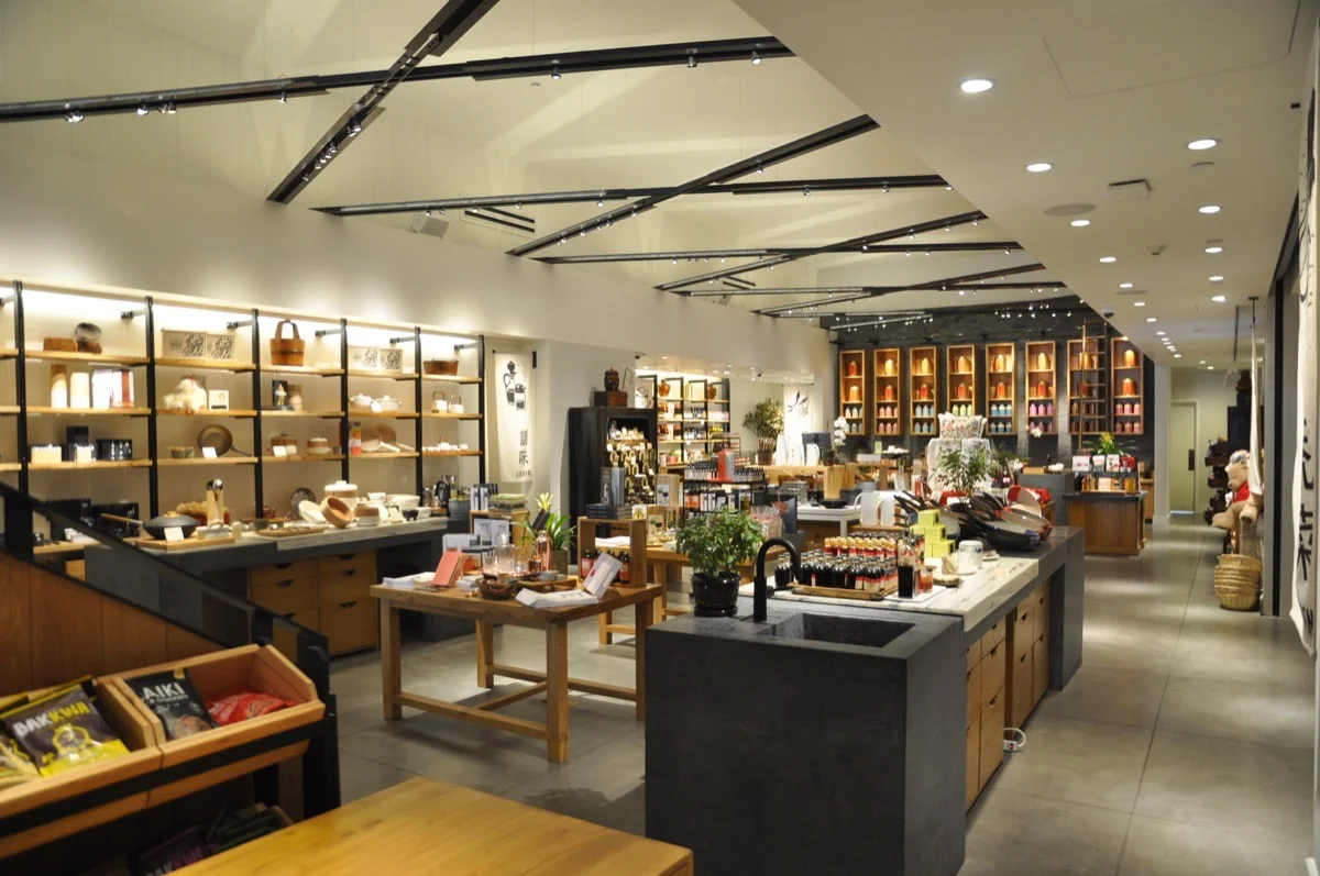 The retail store features plaster finishes.