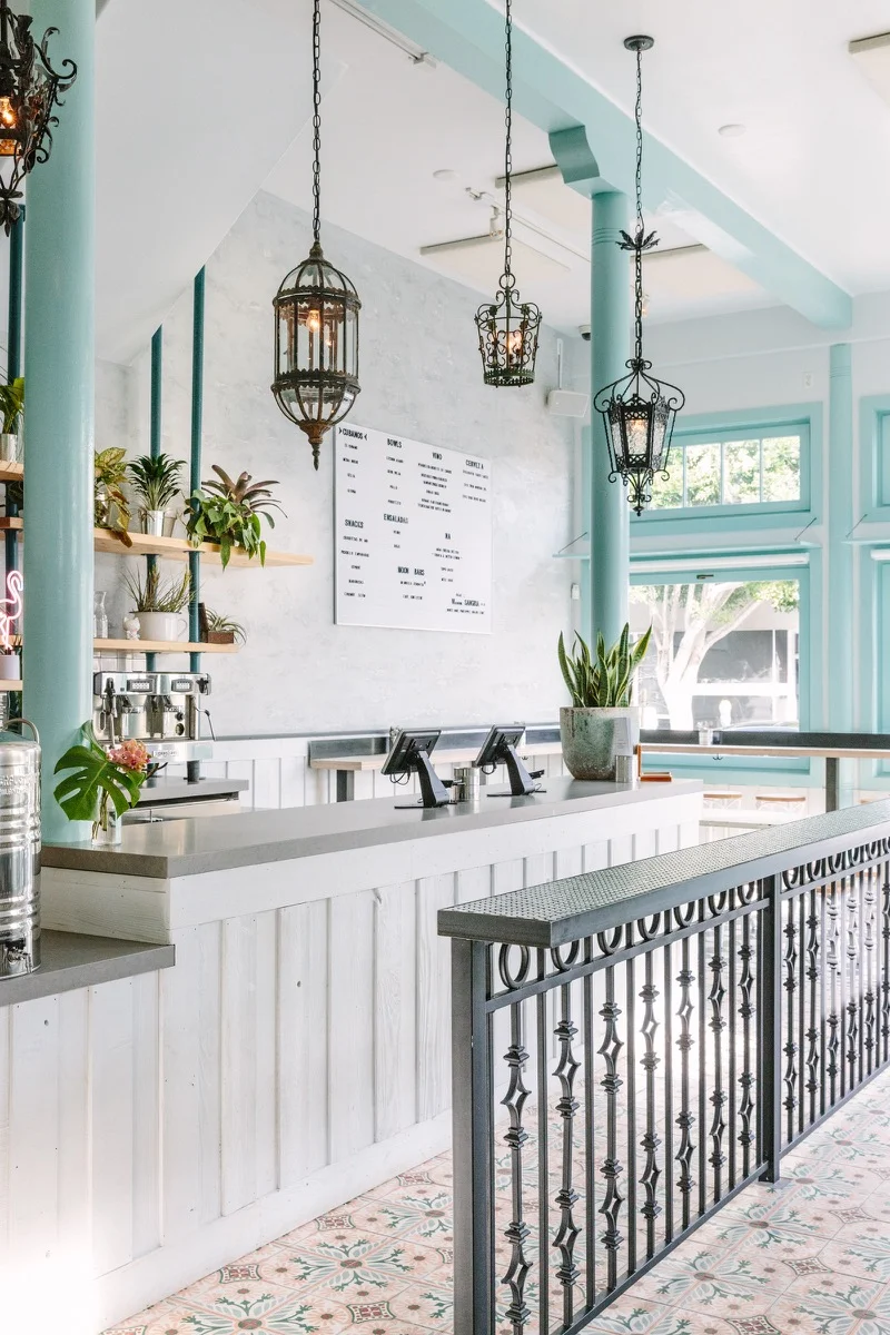 The turquoise plaster is repeated in a saturated turquoise paint choice.