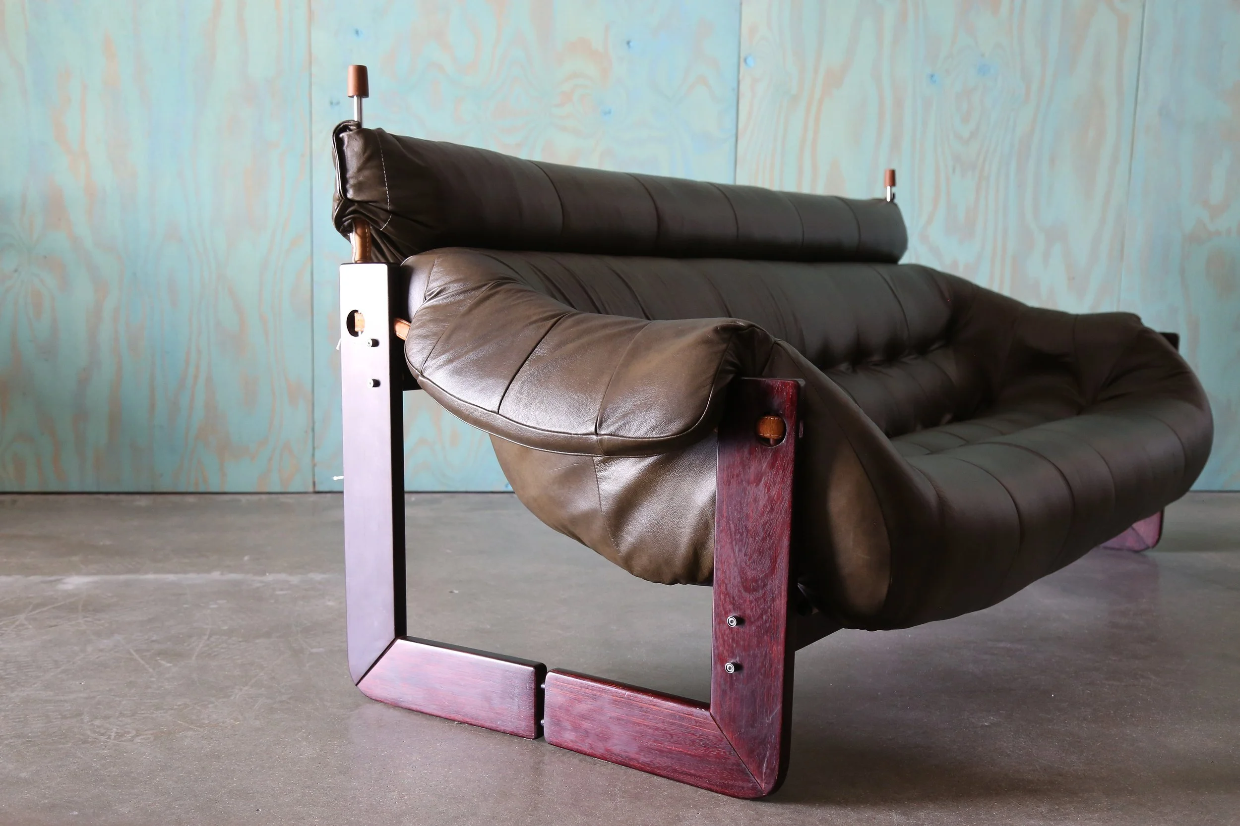 Percival Lafer Green Sofa MP 97 Leather sofa extended head rest.