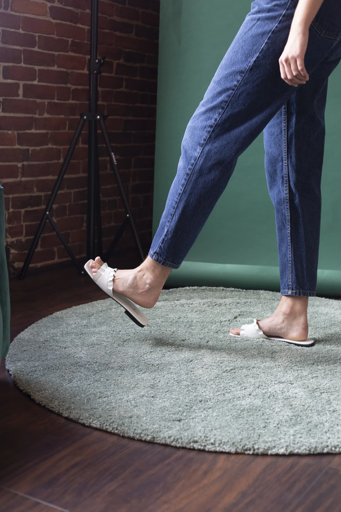 white leather ruffle slides