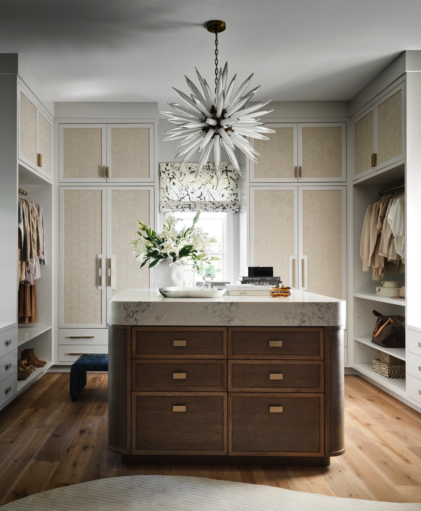 Creating quiet luxury through detail and design. In the primary closet at our #WestRubyProject, every element, from the sculptural pendant to the custom island, layers ease, warmth, and a touch of the unexpected. #caseyhowardinteriordesign 
published