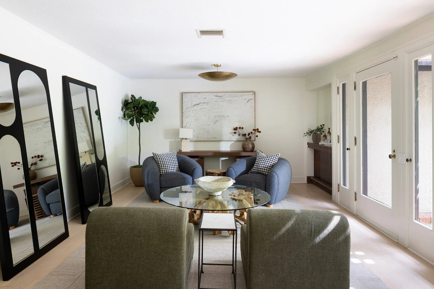 This light and airy lounge unfolds as two distinct sitting areas, designed to create intimate moments within a larger space and extend effortlessly to the outdoors.

The Ball Estate, Alamo California
Luxury Staging &amp; Furnishings: @caseyhowardinte
