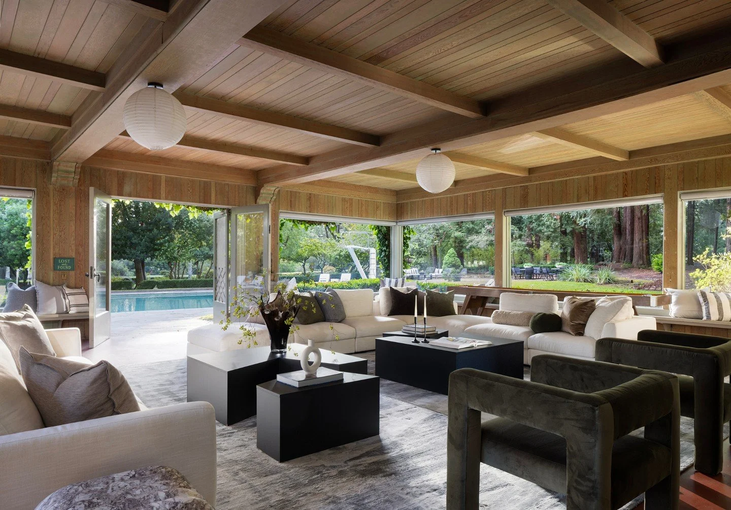 One of our favorite spaces on the property, the Pool House is a playful yet cozy retreat. Layered materiality, clean modern lines, and a neutral palette come together to create a relaxed sense of ease, seamlessly connected to the surrounding woods an