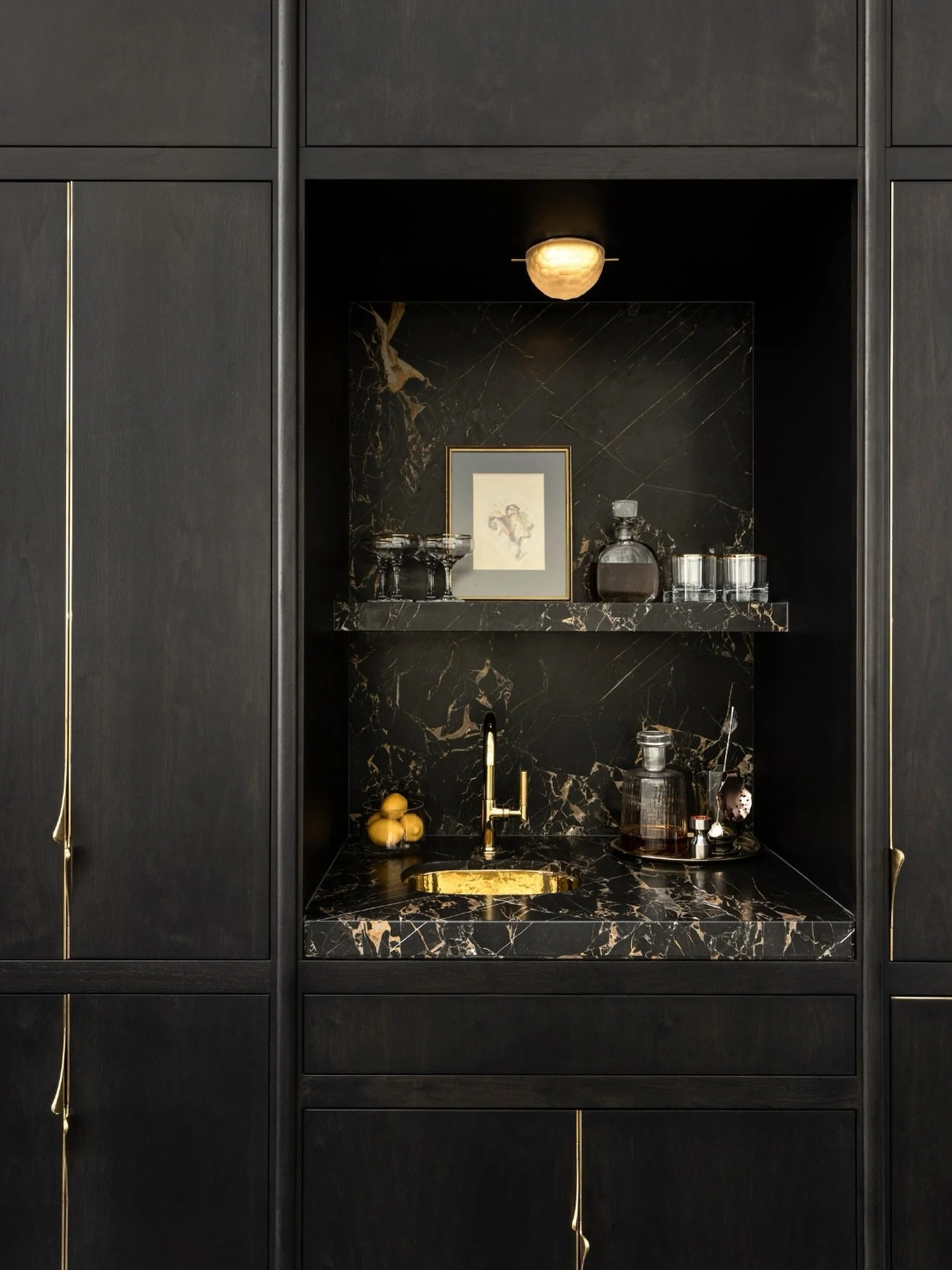 A thoughtfully designed beverage station, coffee bar, or display niche transforms an underutilized corner into a space that supports daily rituals while adding beauty and function.
It's these intentional moments that give a home its character and mak