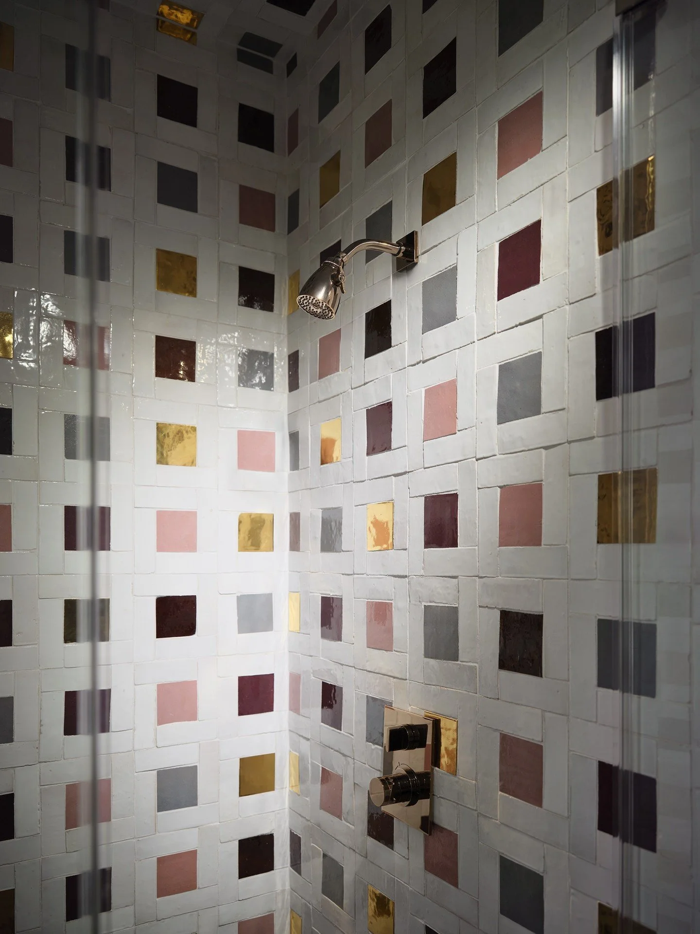 Not your everyday tile installation. The irregular texture of zellige, playful pops of color, and unexpected metallic accents make this custom mosaic feel incredibly special.
#inspo #designby @ashtontaylorinteriors