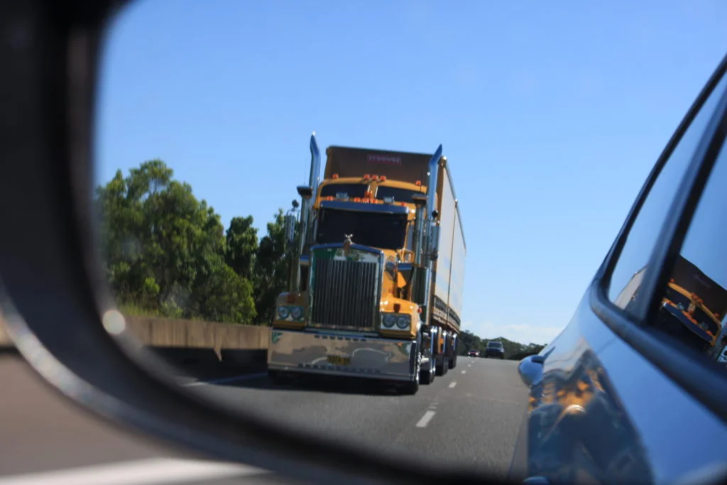 Simple gauge for a safe distance when merging in front of a big truck.