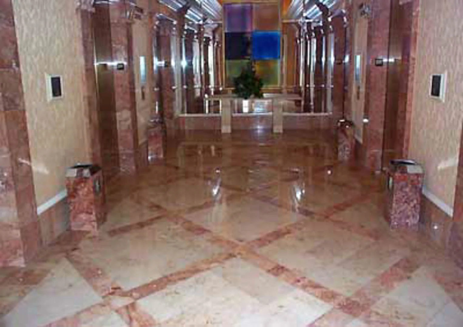 Project: Caesars Palace Hotel Location: Las Vegas, Nevada Description: Interior Paving This photo shows fossilized limestone from Germany with accent bands of pink Italian marble.