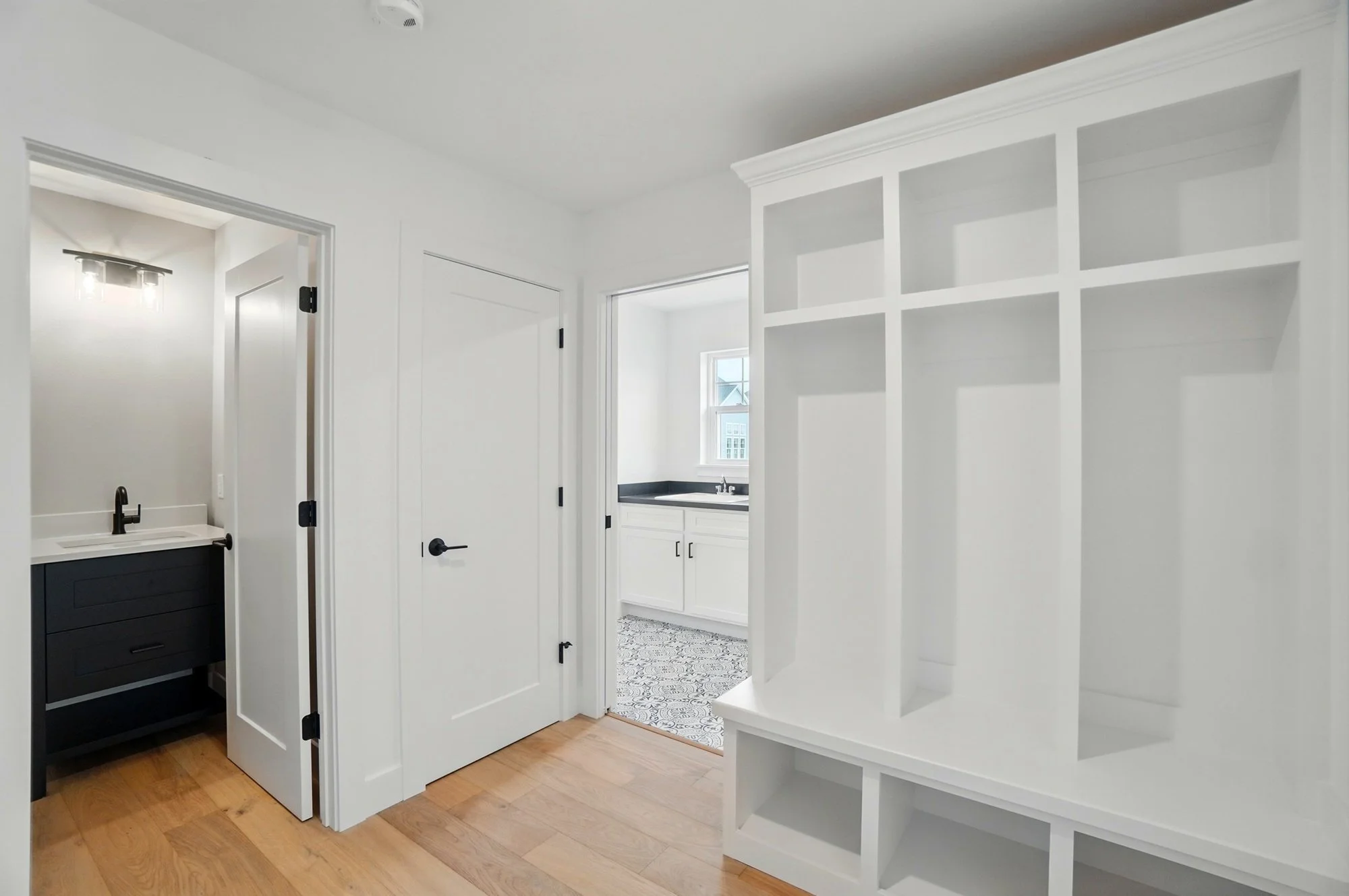 The Lexington: Lockers, Powder Room, Laundry, Storage Closet