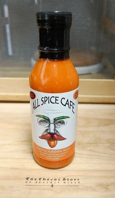 bottle of all spice cafe cayenne habanero sauce
