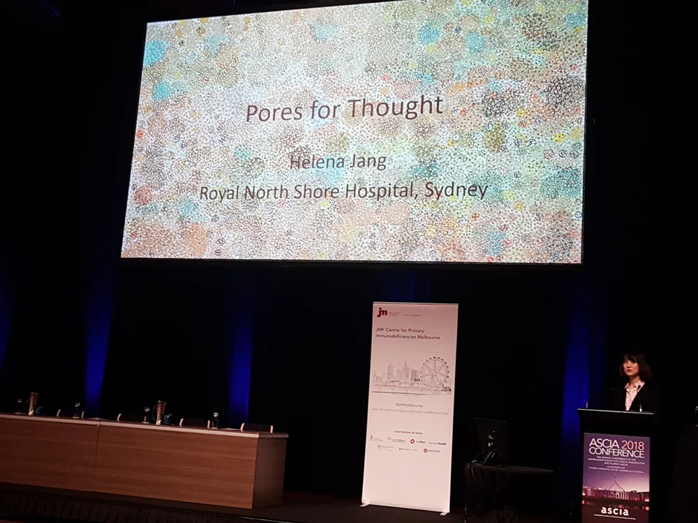 Dr Helena Jang presenting her winning talk