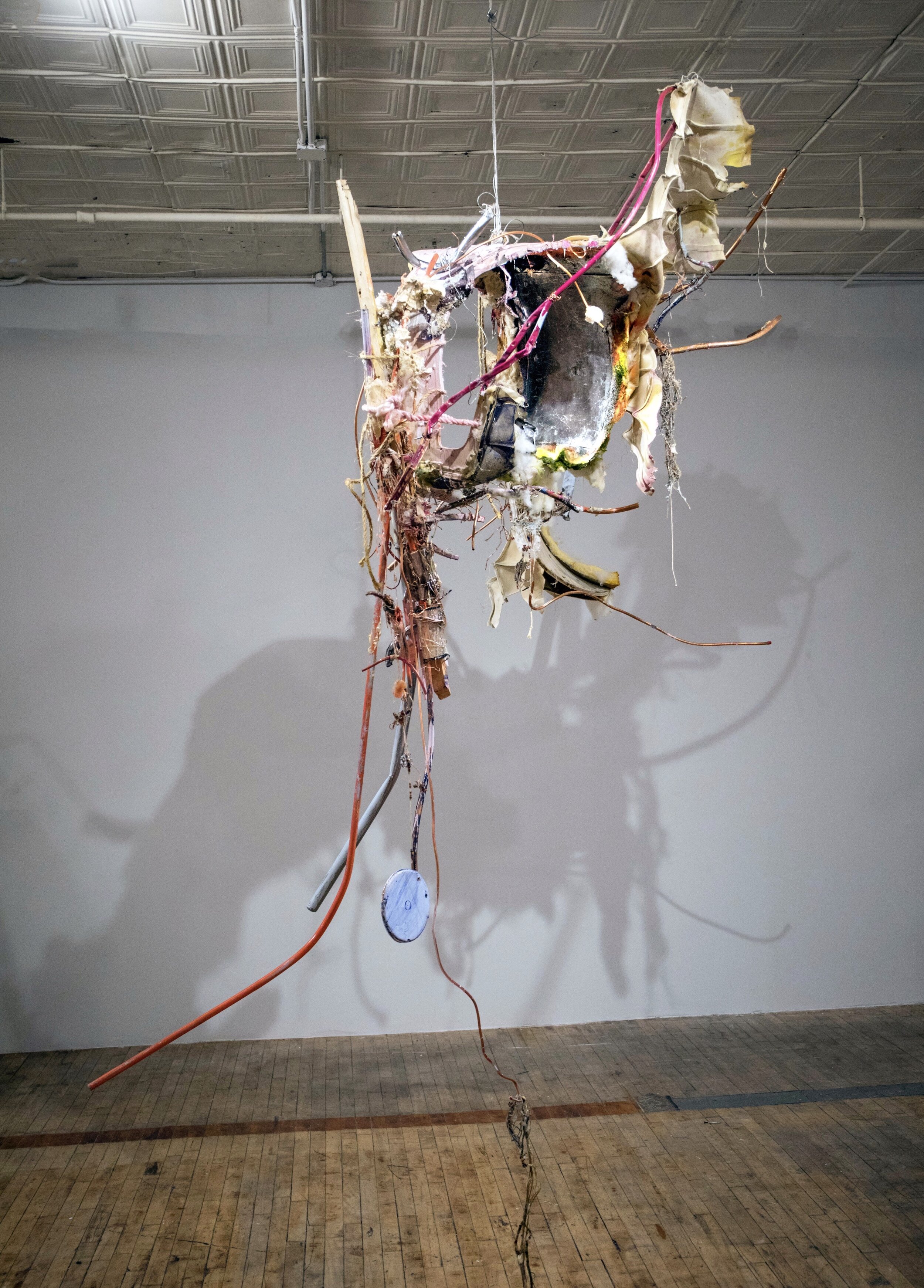 Daniel John Gadd,  A Place for You , 2019, wood, plaster, epoxy resin, copper, glass, rope, oil paint, synthetic leather, and fibers, 115 x 100 x 75 in.
