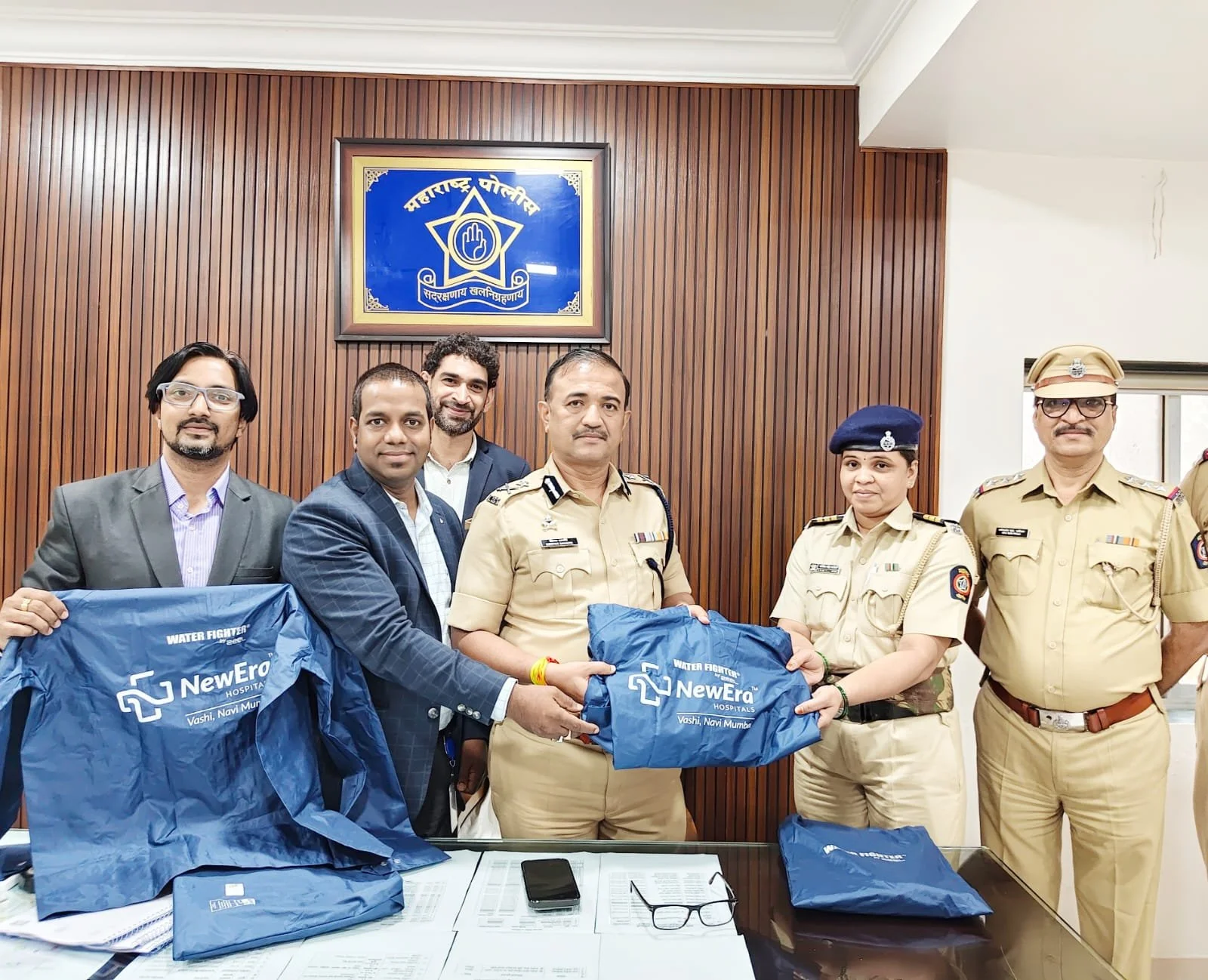 NewEra Hospital Distributes 150 Raincoats to Police Personnel Braving the Monsoon