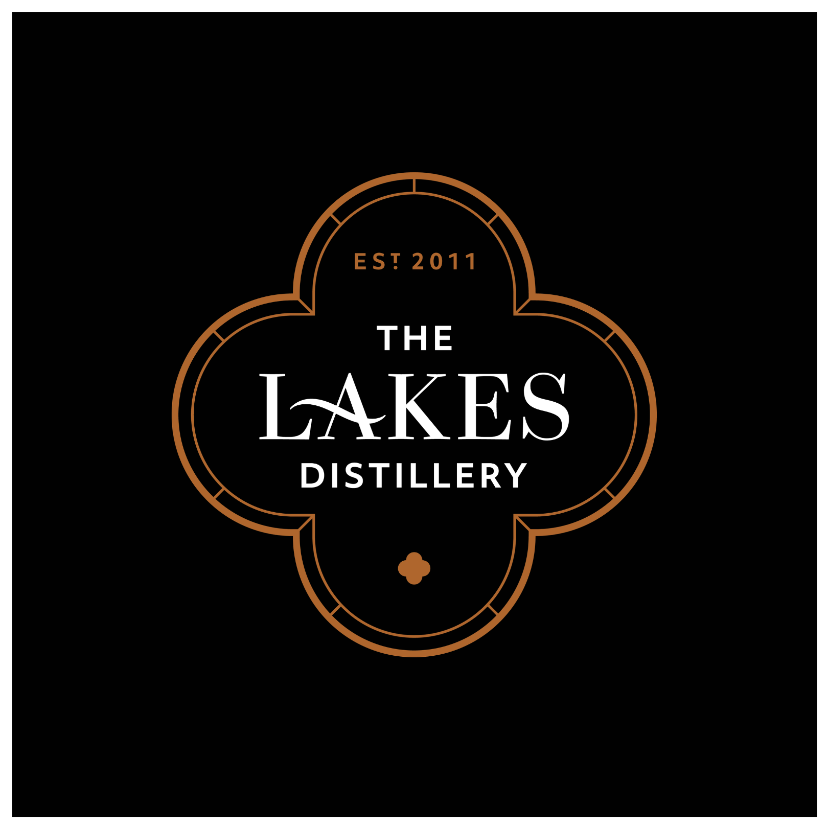 Logo for The Lakes Distillery with a clover-shaped border and the text 'EST 2011', 'The Lakes Distillery' on a white background.