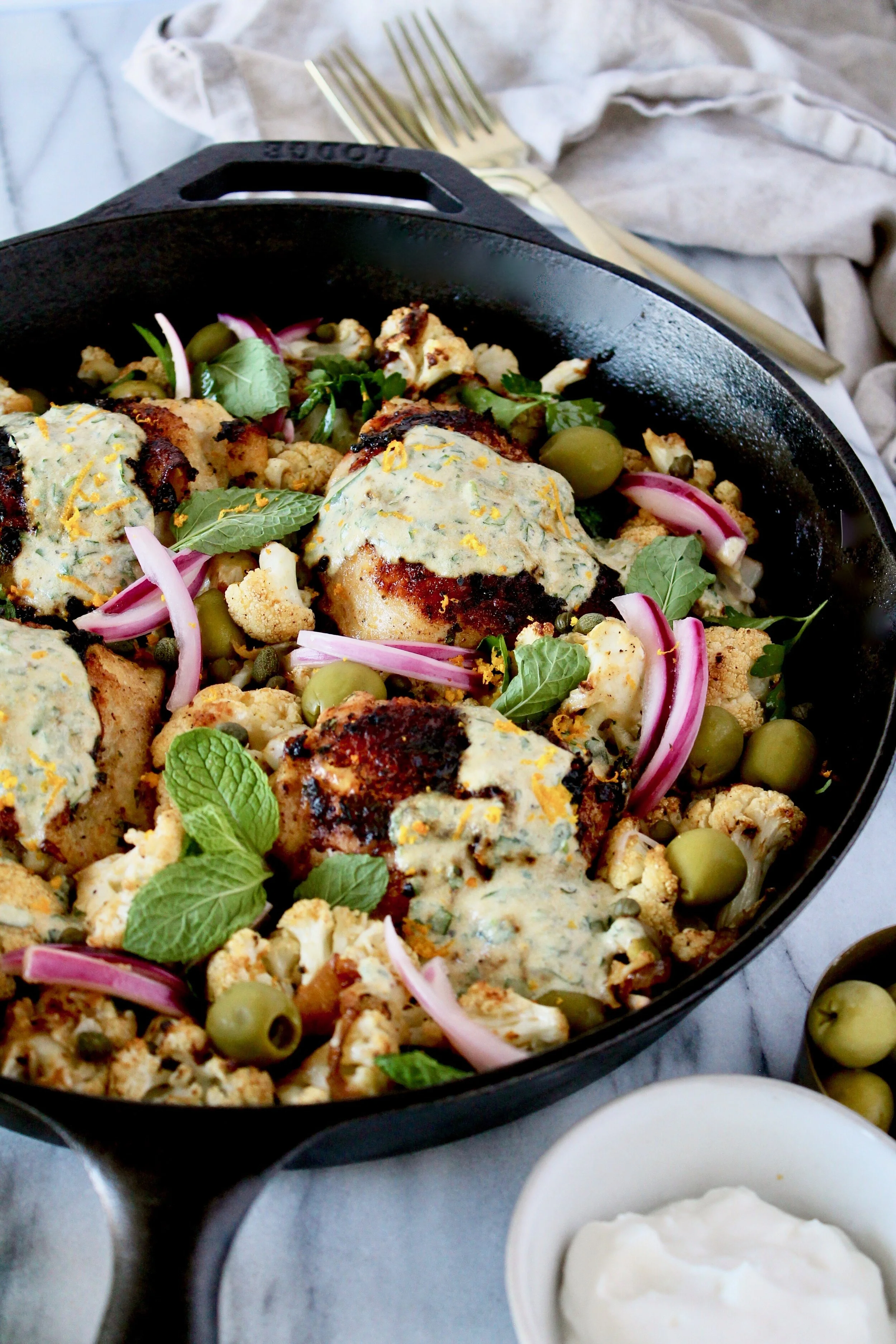 yogurt herb marinated chicken thighs with garlic roasted cauliflower