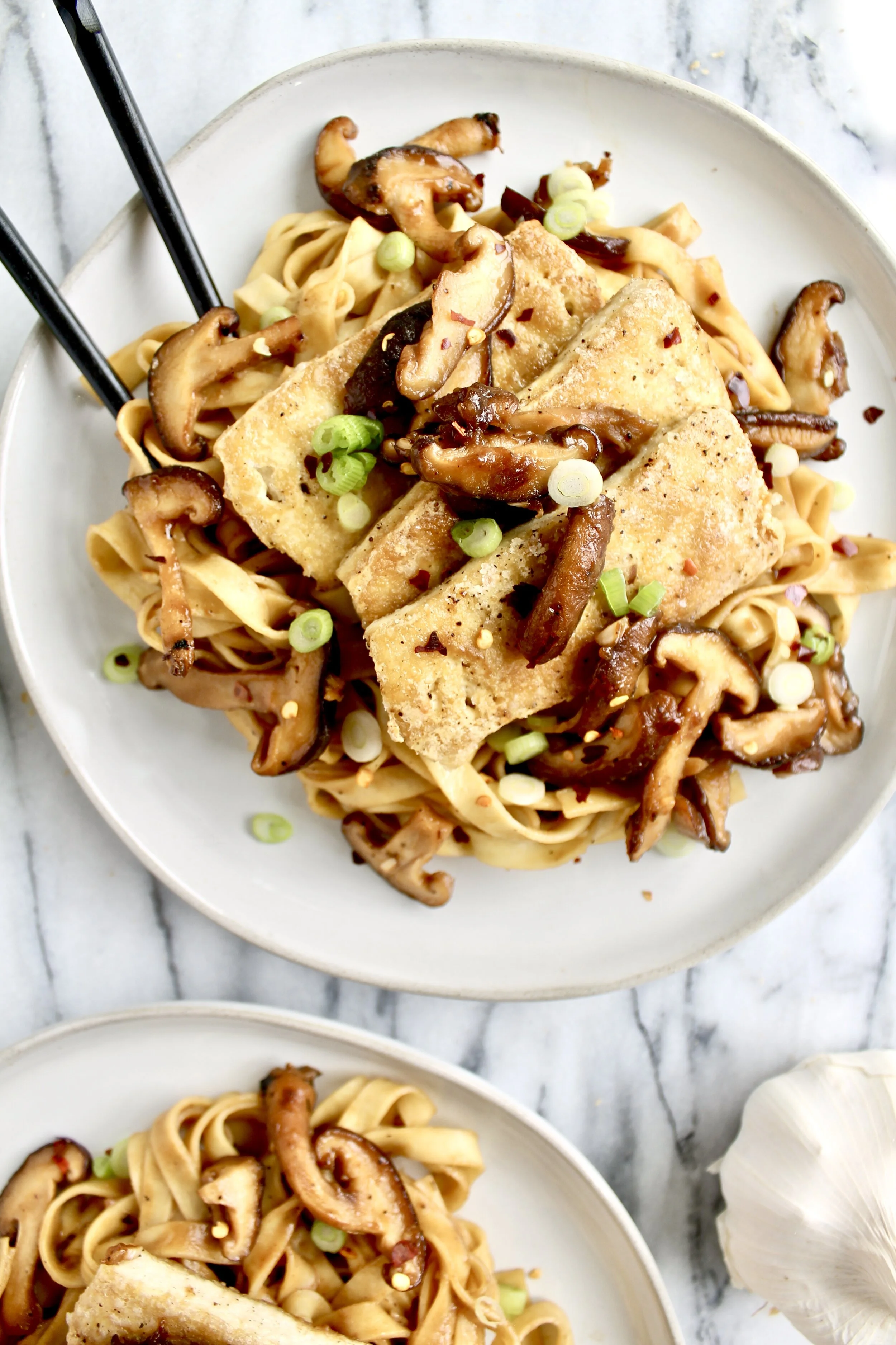 sweet and sticky garlic shiitake noodles with crispy tofu — Honey Street