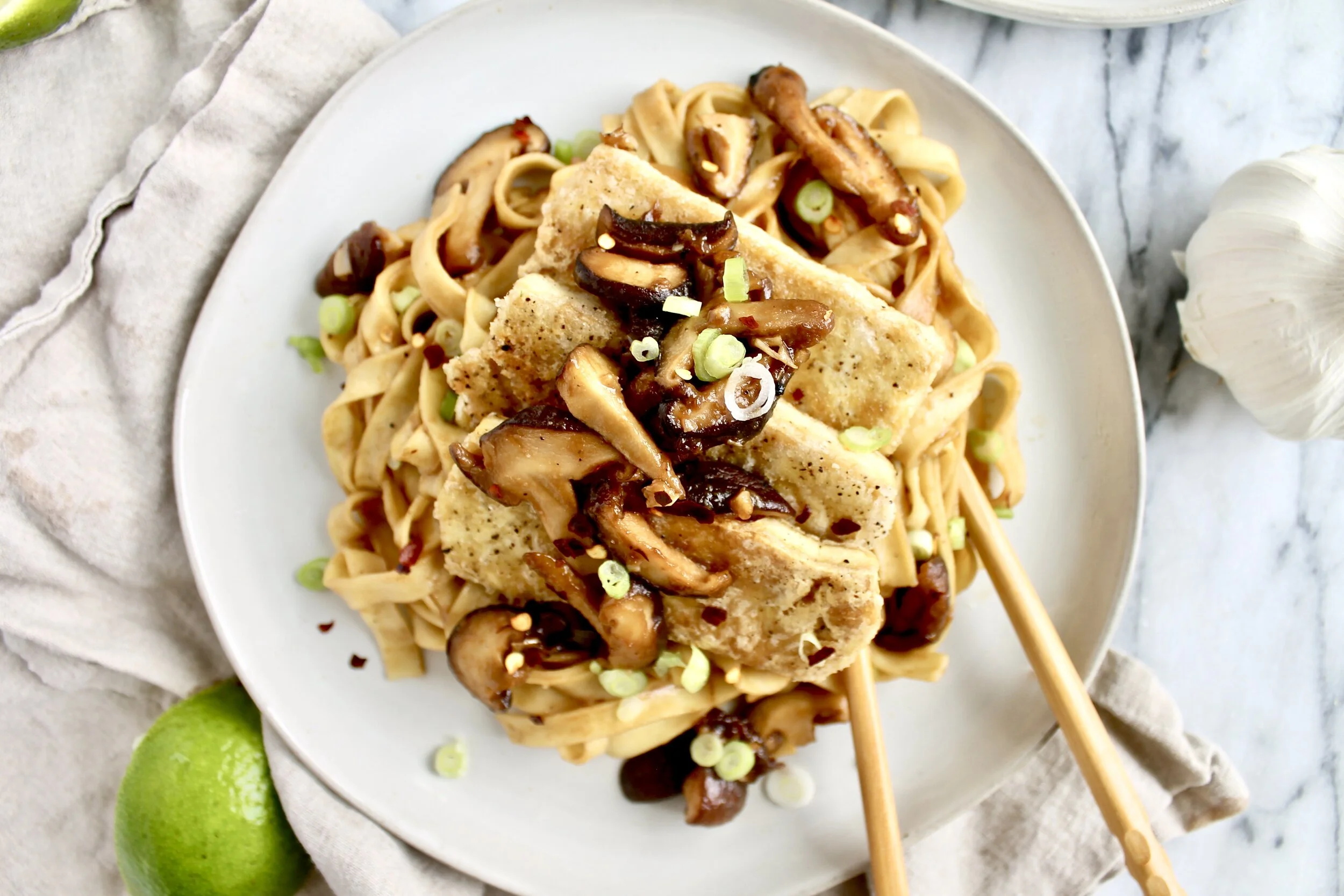 sweet and sticky garlic shiitake noodles with crispy tofu — Honey Street