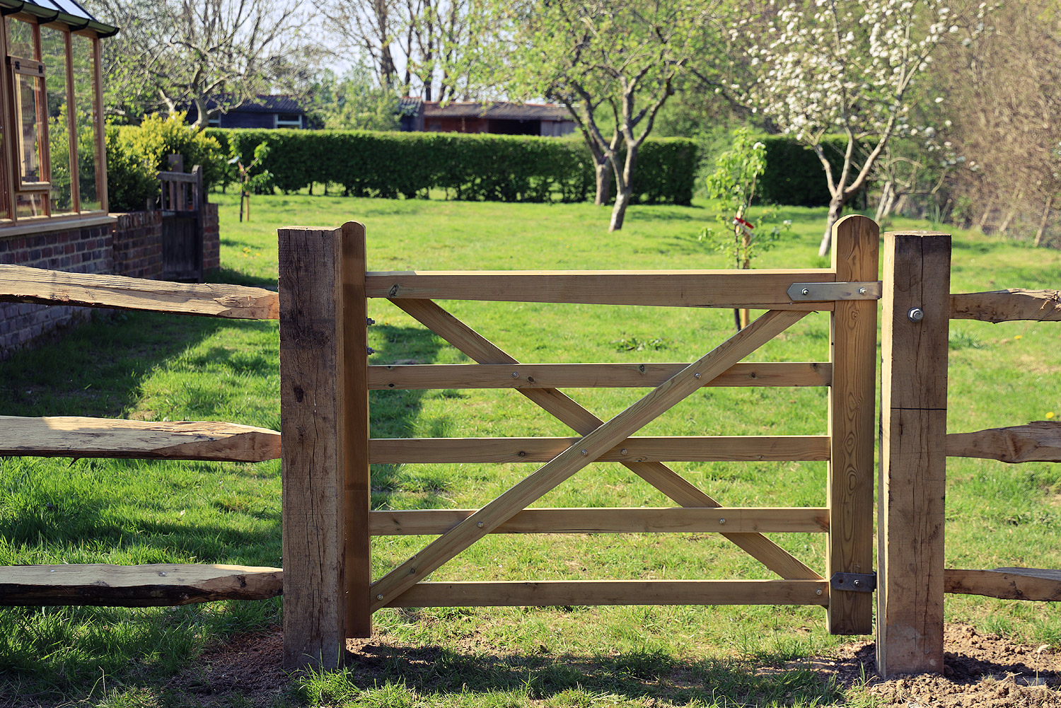 In April we had a new gate and fencing put up to separate the compost area from the orchard.