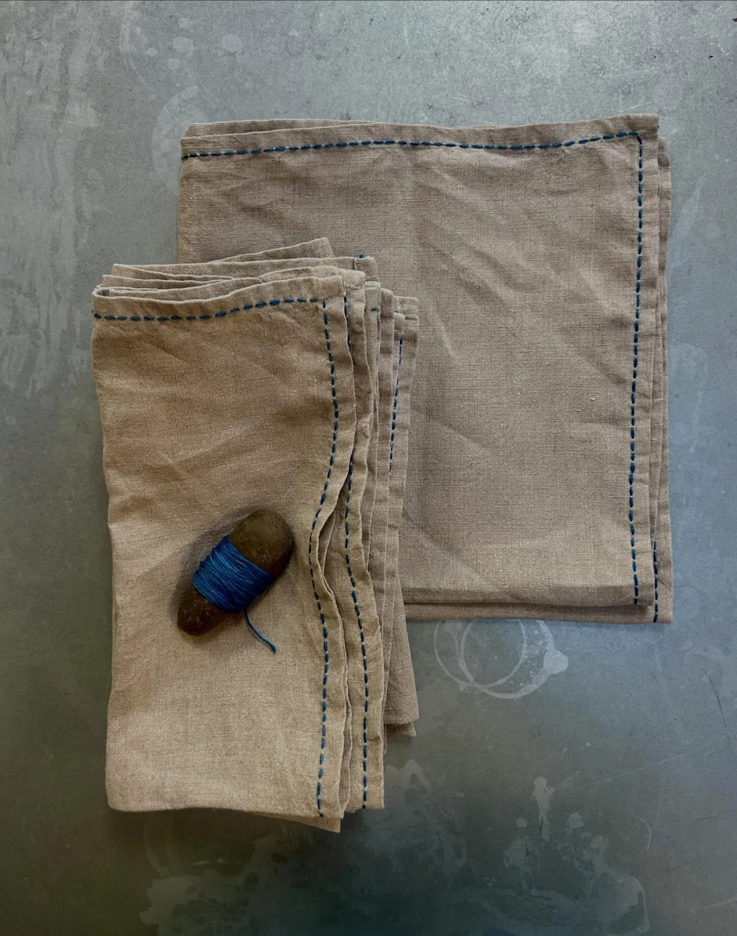 🧵 Hand stitched Indigo dyed cotton embroidery thread on undyed linen napkins. 
First outing for these @water.lane Spring Fair this weekend. 
Saturday &amp; Sunday 10-4
Hope you like them 

#thenaturaldyeworks