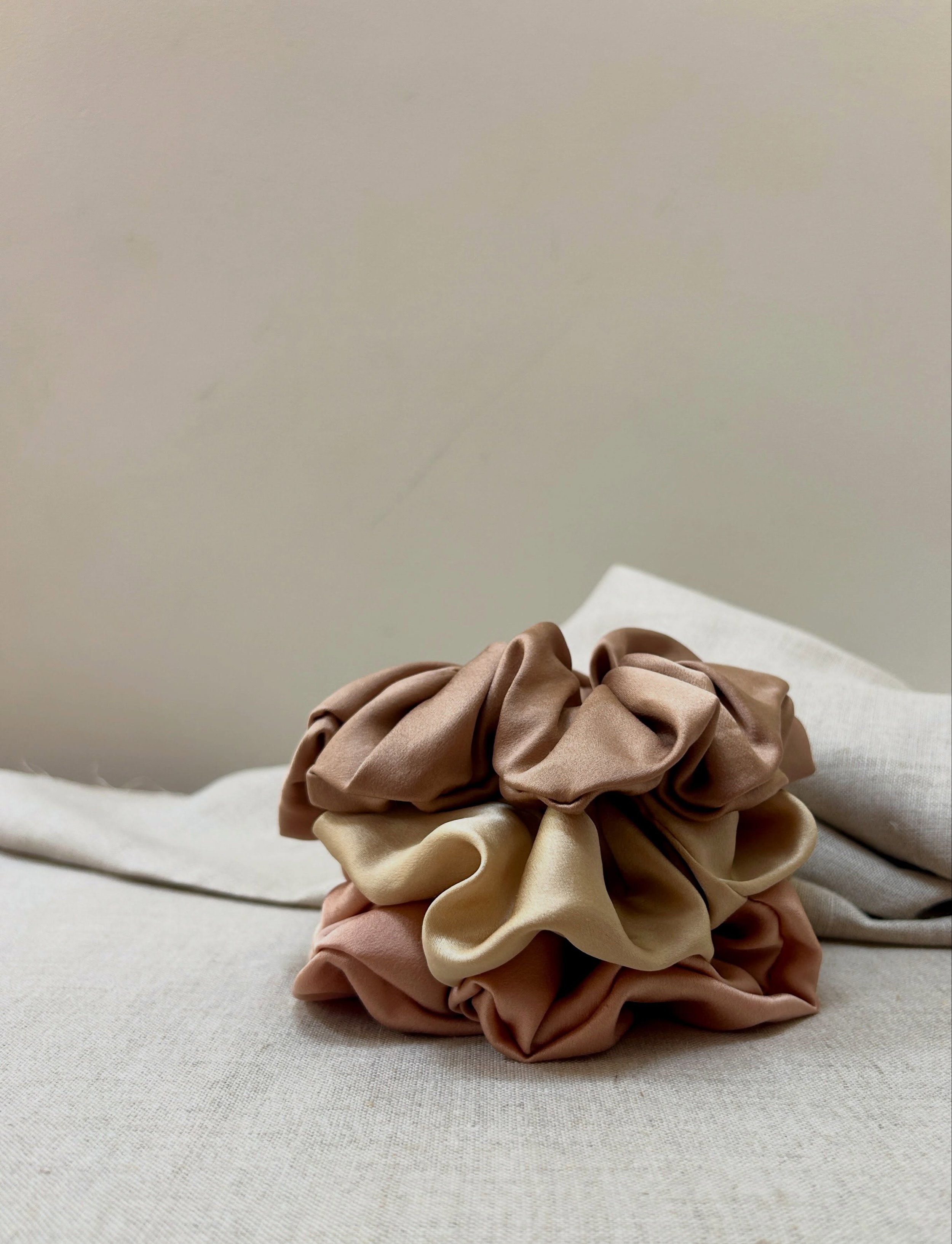 Neapolitan scrunch

New silk satin scrunchies in Nutmeg, Musk Rose &amp; Pale  Gold