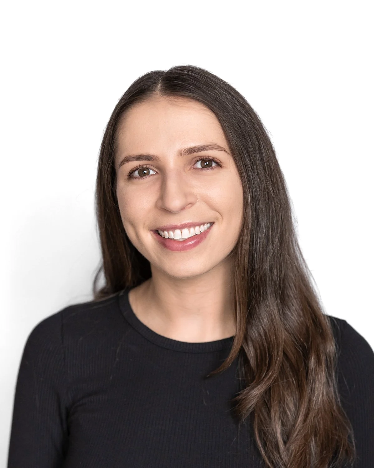 New York headshot with a white backdrop