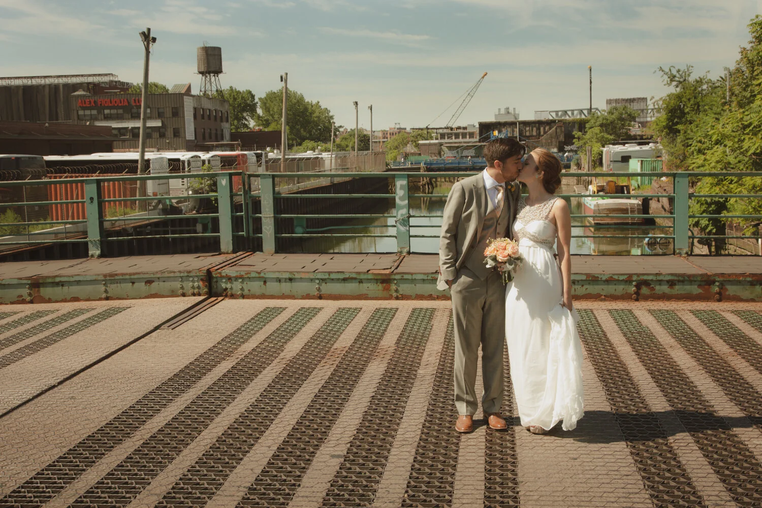  Brooklyn wedding photographer with couple on a bridge in Gowanus 