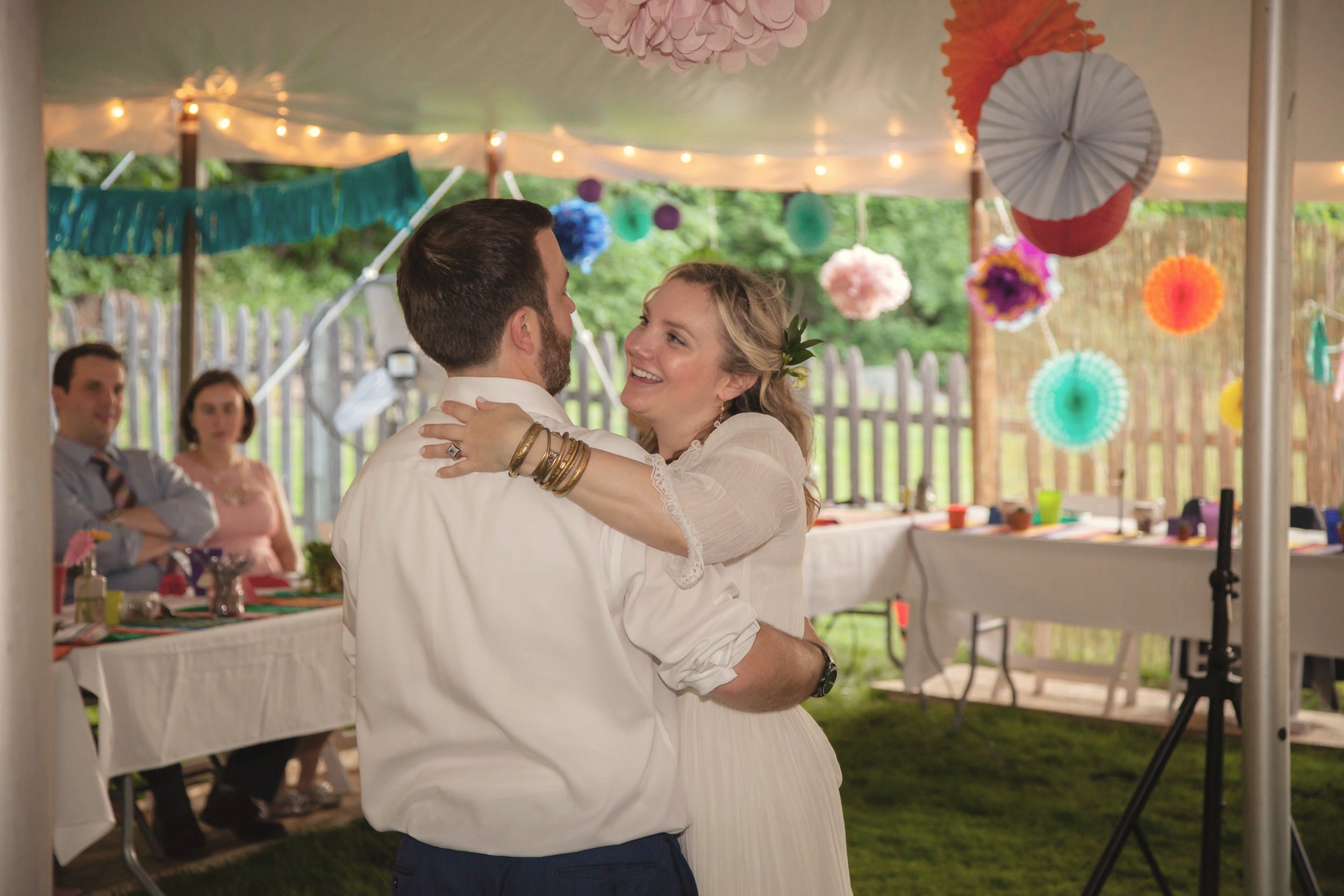 Tent wedding with a couple dancing by a New York wedding photographer.