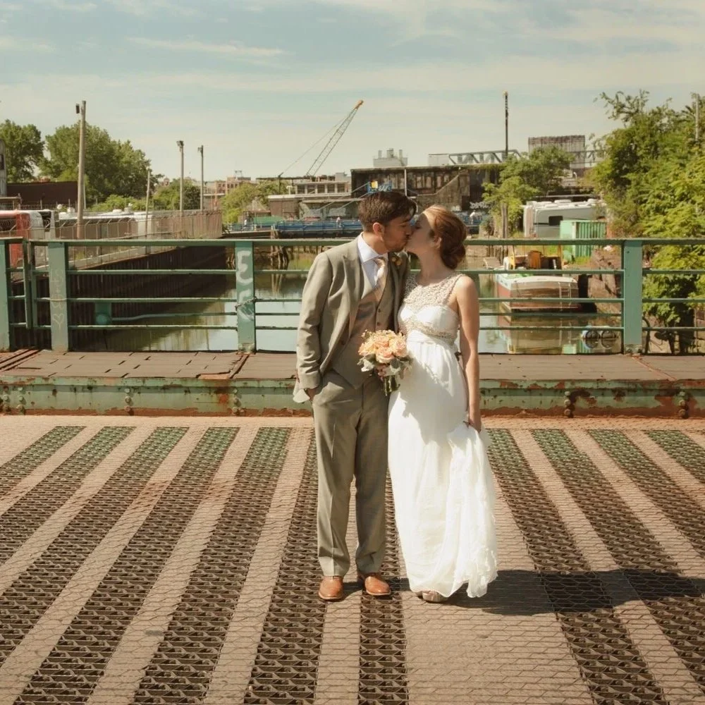 Brooklyn wedding photographer with couple on a bridge in Gowanus