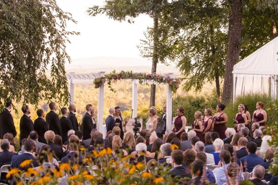NYC Wedding photographer at a Jewish wedding under a chuppah.
