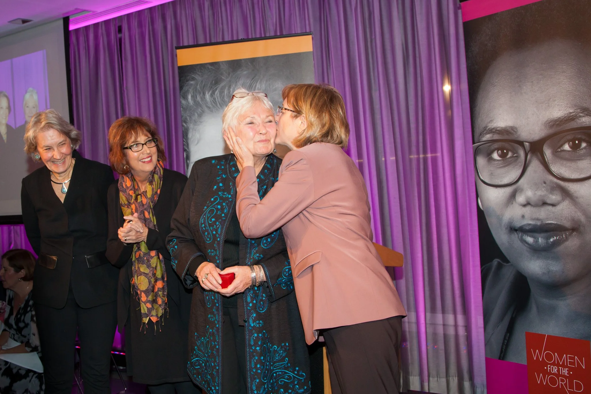  Smith President Kathleen McCarthy Kisses a volunteer on the cheek at a Volunteer banquet and NYC event photographer Elizabeth Solaka is working the event. 