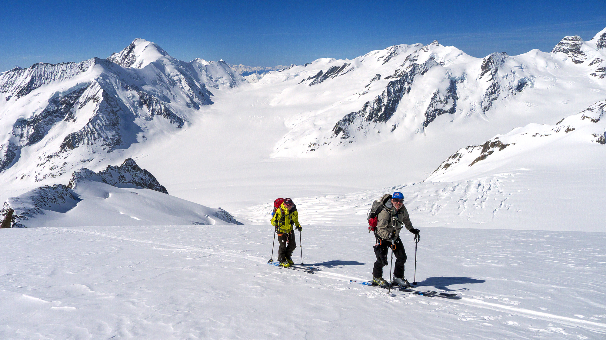 Mark and Cary ski touring high in the Bernese Alps