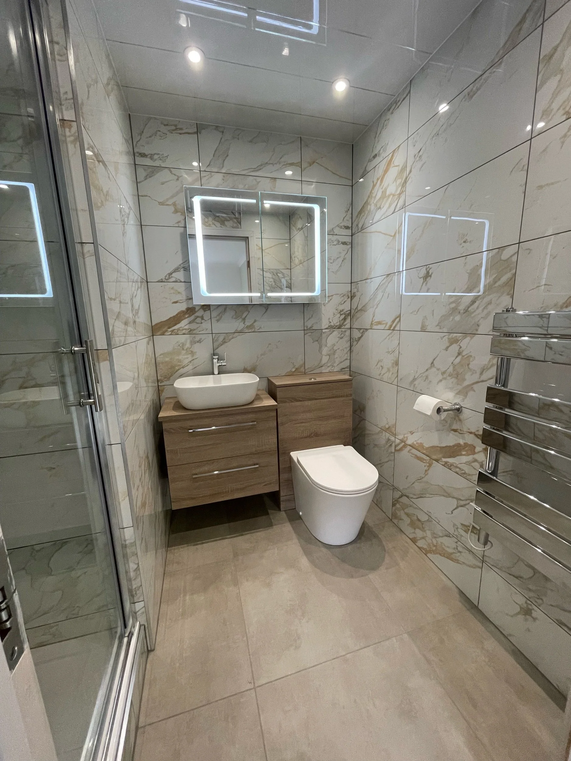 Bespoke bathroom installation in Glasgow with modern cabinets