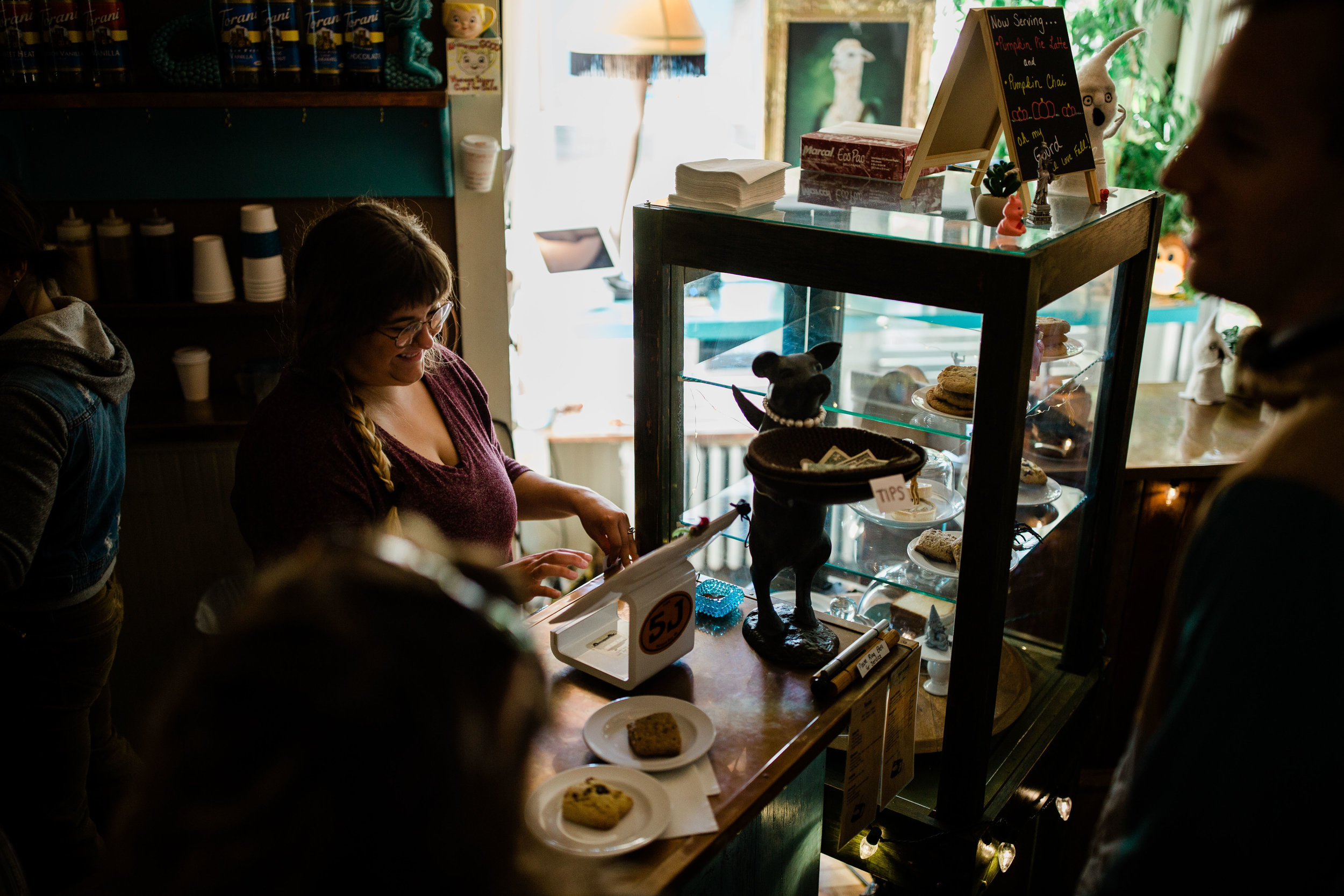 Helping customers order coffee and food