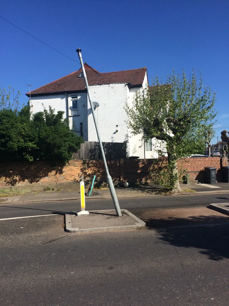 Bulb down: and placed neatly aside the road.