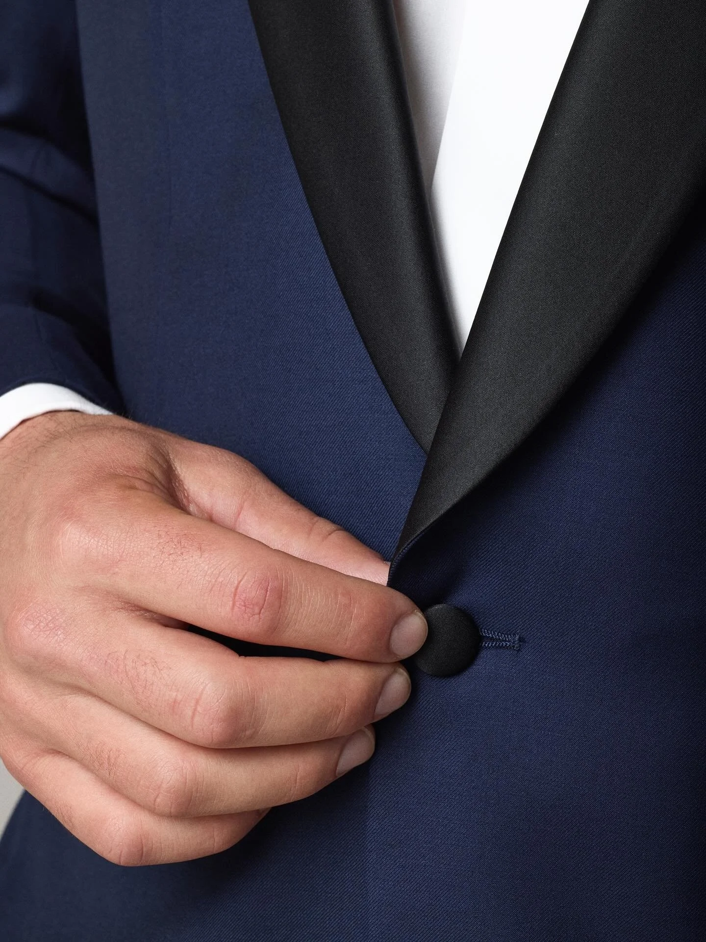 Details make the difference.⁠
⁠
This close-up of our Shawl Lapel Tuxedo&mdash;shown in Blue, also available in Black&mdash;highlights the craftsmanship and precision that define every Maxman garment. Part of our year-round Stock Program, our tuxedos 
