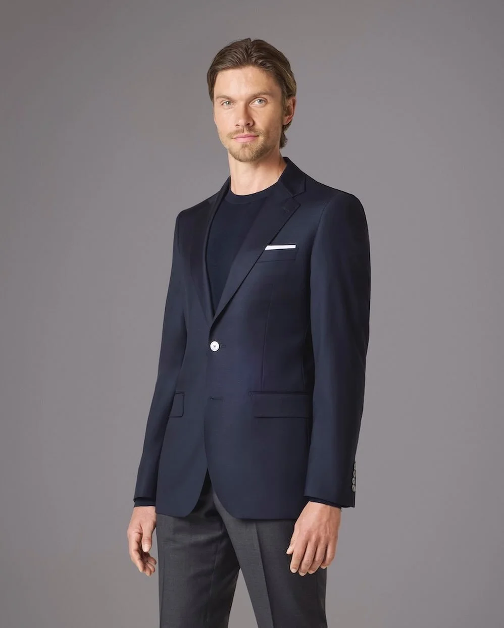 Smooth. Structured. Always in style.⁠
⁠
Our Navy Blazer from the Stock Program is shown here in our smooth fabric option&mdash;offering a clean, modern finish. All Maxman blazers are available in a variety of classic colors and two distinct fabric te