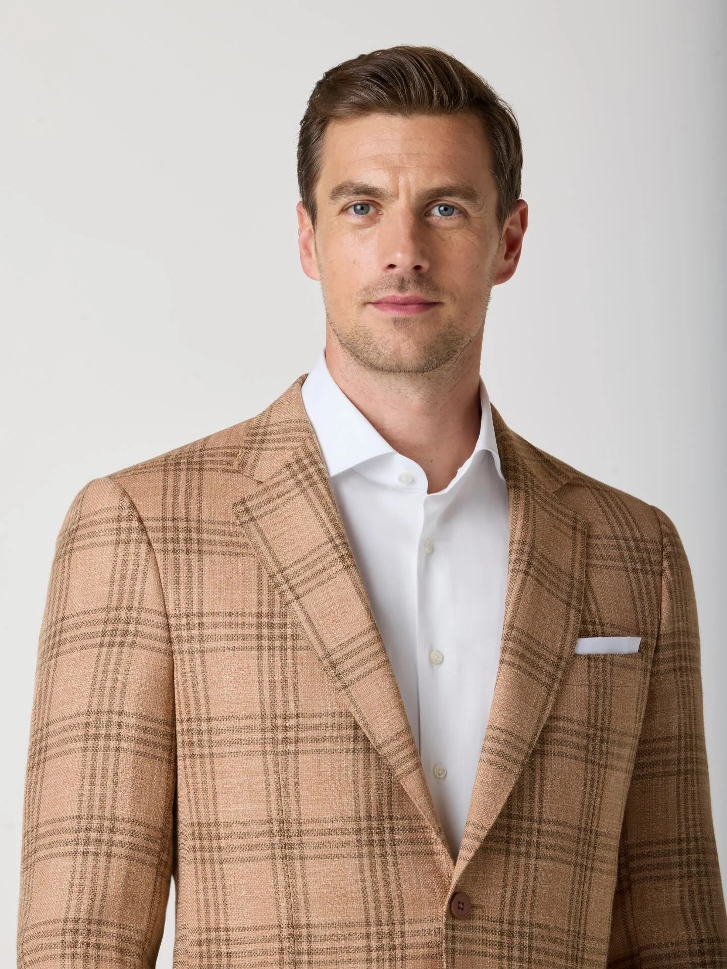 Where texture meets precision.⁠
⁠
A close-up of our Copper Plaid Soft Coat from the Spring/Summer 2026 Collection. Crafted from a refined blend of wool, silk, and linen using fabric from the prestigious Italian mill Drago, this piece reflects the ele